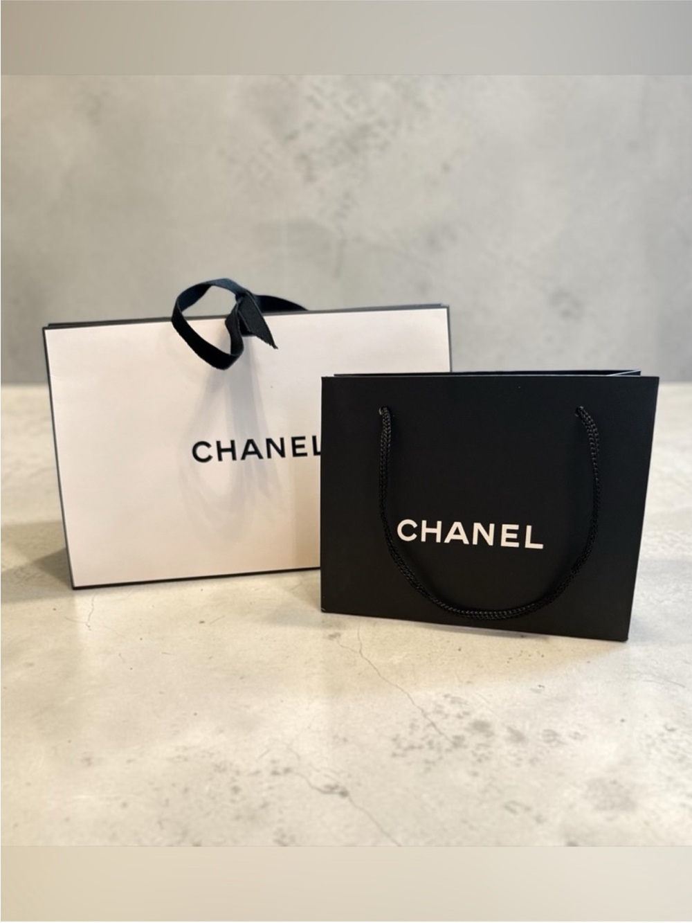 CHANEL Black and White Shopping Bags
